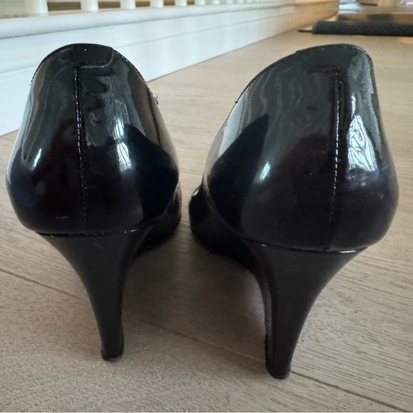 Jimmy Choo Baxen Patent Wedge Pump in Black
Size 37.5 - Picture 8 of 10